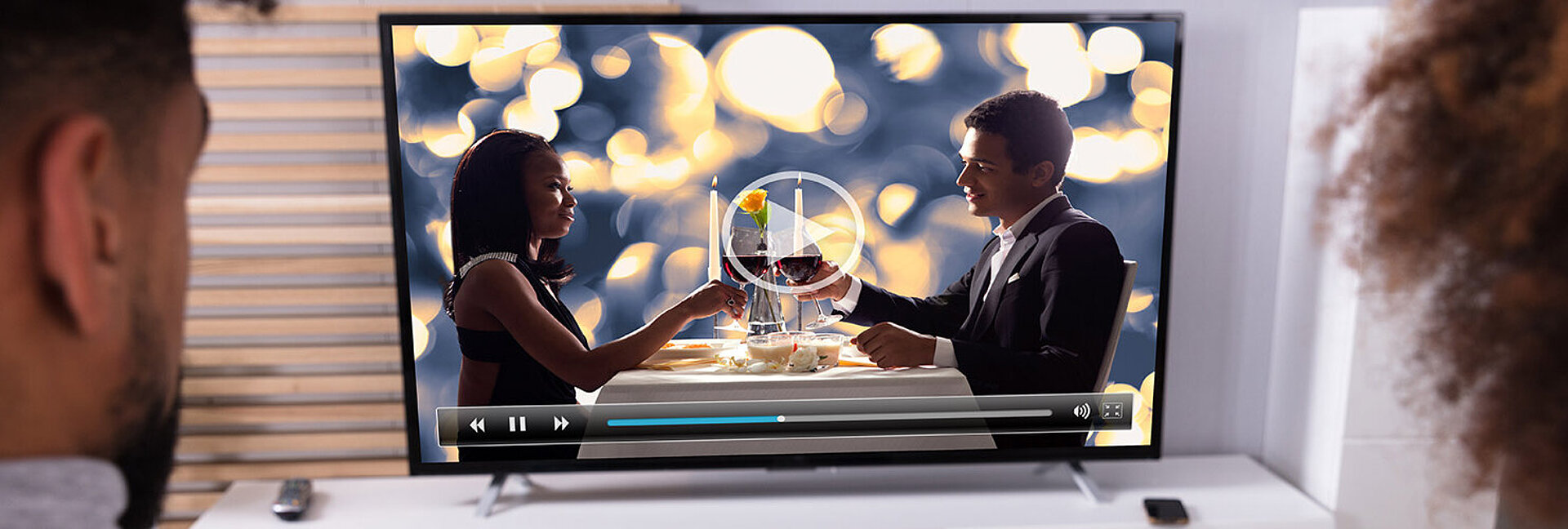 ORS - Video Streaming Couple in front of TV screen