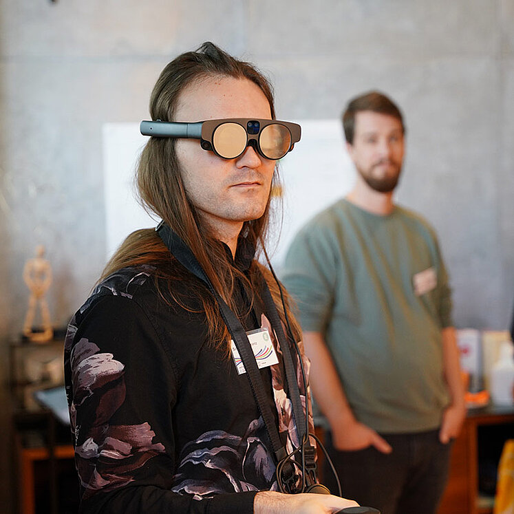 Metaverse - A new world of virtual interaction man with AR glasses